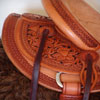 Half tooled Vaquero Lace with Daffodil flower Wade Saddle
built on a 94 degree bar that fits a well built muscular shoulders -
The seat is finished at 15 & 1/2 inch with a close contact deep pocket fit -
Gullet is 7 & 1/2 inch height by 6 & 1/2 width with the back hand hole width at 4 inch -
Horn is 6 inch height by 5 and 1/2 inch width Guadalajara at 31 degree pitch - Cantle is 4 and 1/2 inch in height by 12 & 1/2 in width with a Cheyenne roll - Flat plate riggin at 7/8ths
- leather lined 5 inch Stainless Steel Moran Stirrups .